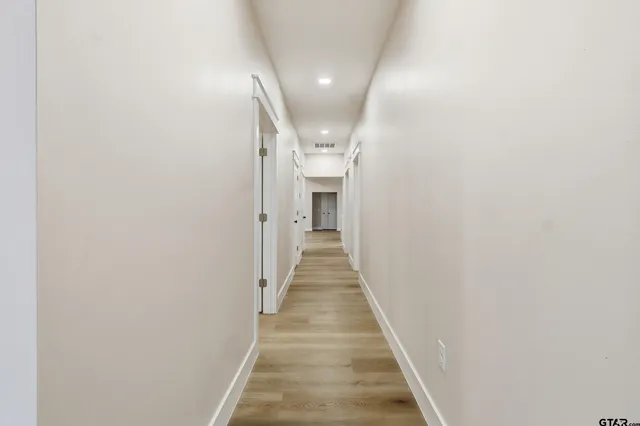 a kitchen with stainless steel appliances kitchen island a large island in the center