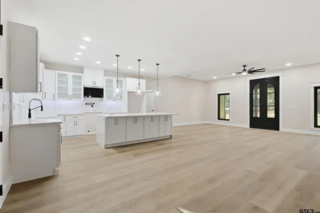 a view of backyard with green space