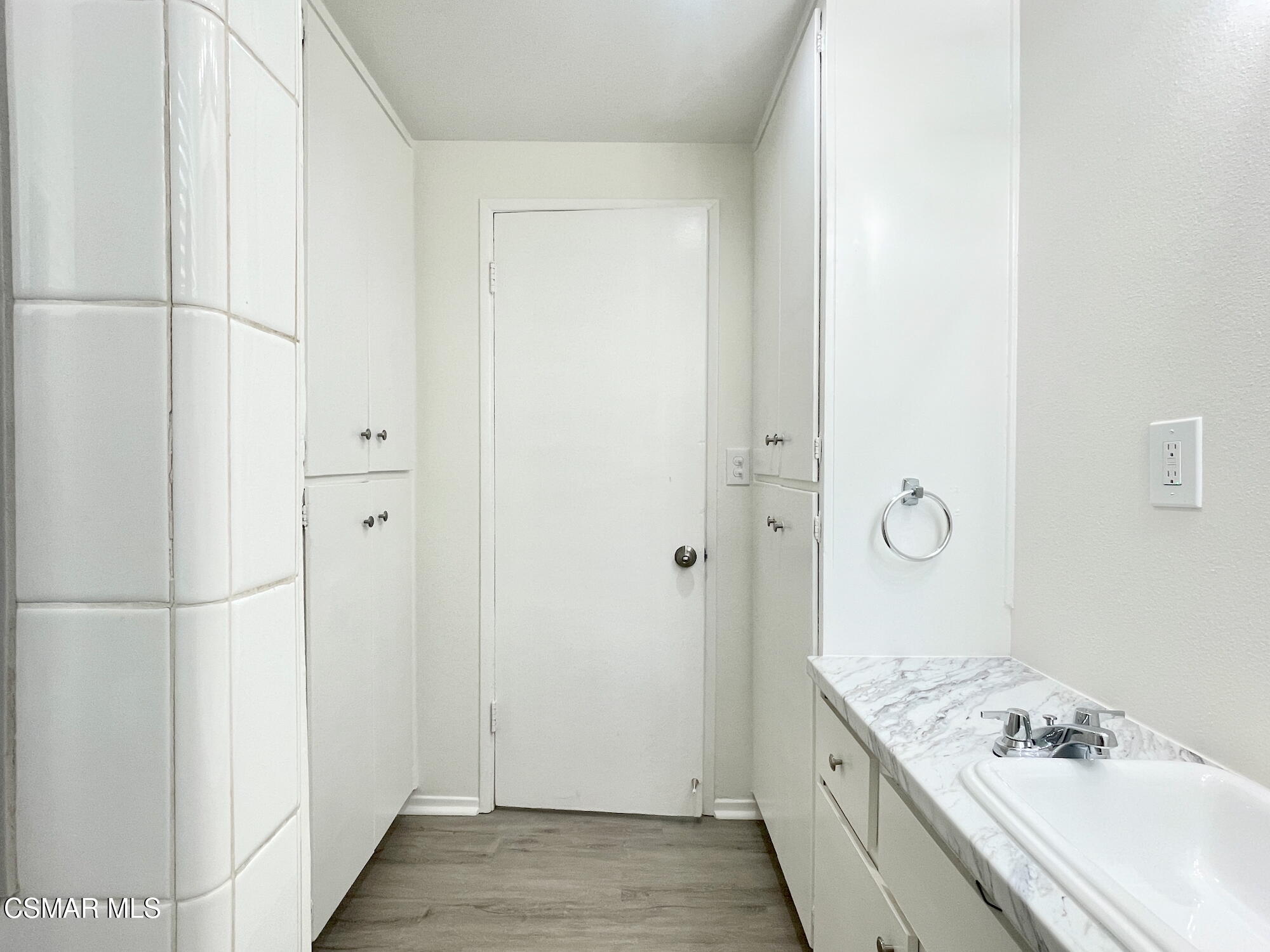 4327 Lou Drive Simi Valley, CA 93063 - Photo 14 of 23 a bathroom with a granite countertop sink and a mirror
