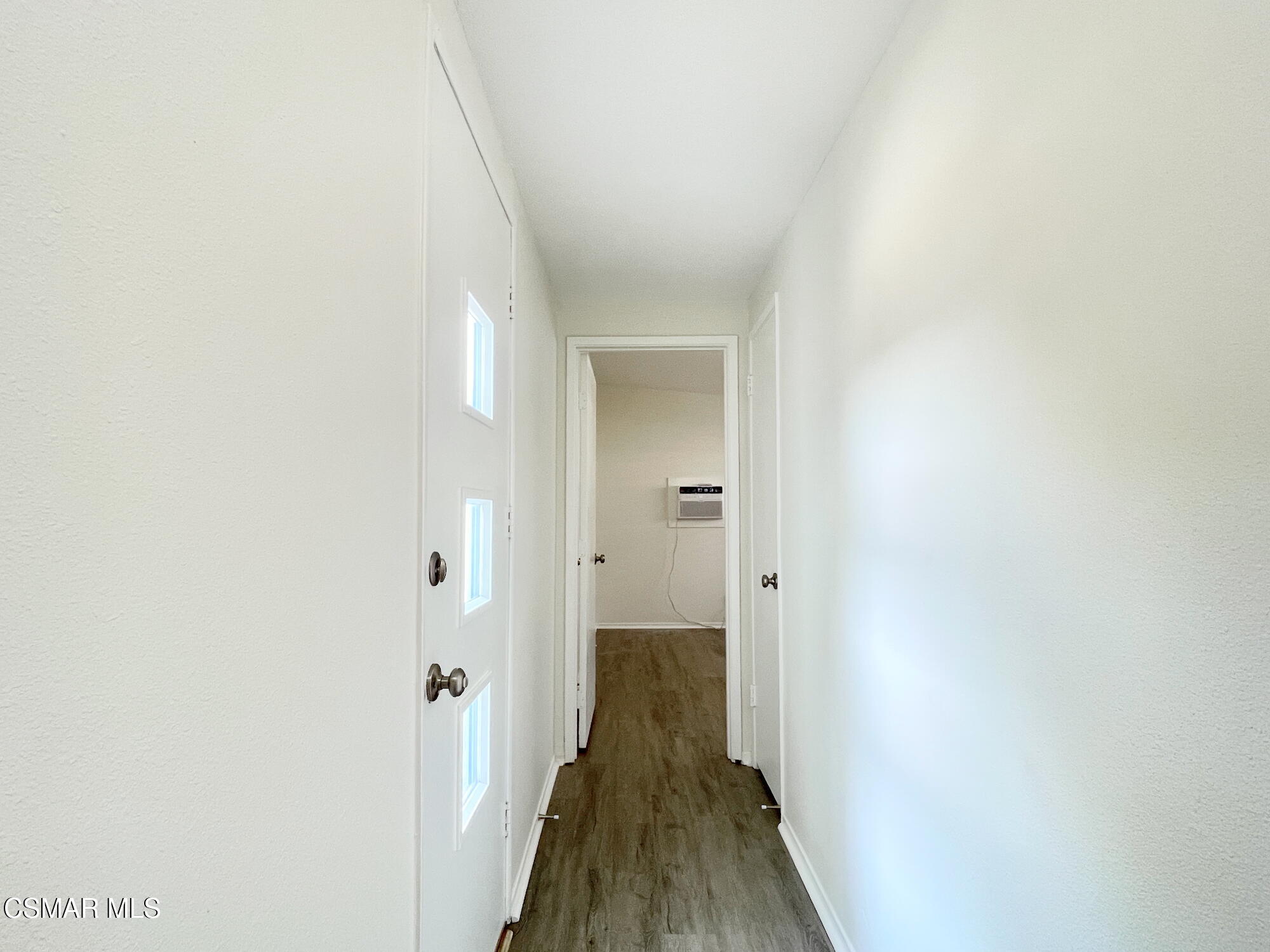 4327 Lou Drive Simi Valley, CA 93063 - Photo 15 of 23 a view of a hallway with wooden floor