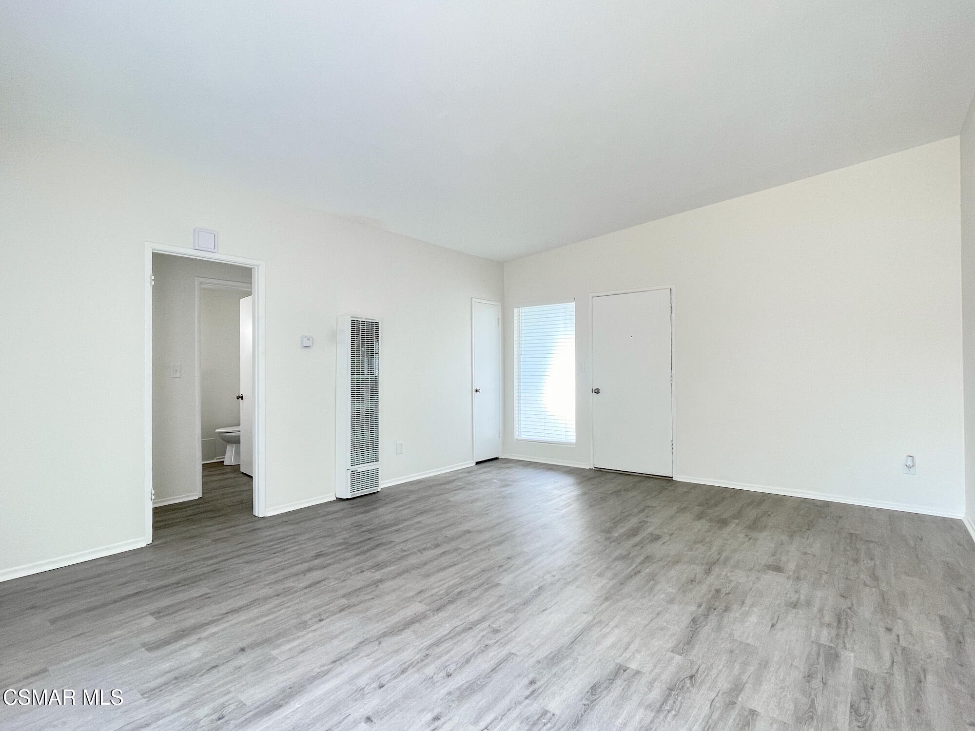 4327 Lou Drive Simi Valley, CA 93063 - Photo 6 of 23 a view of an empty room and wooden floor