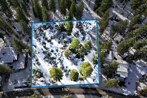 an aerial view of residential house with outdoor space