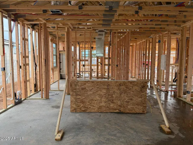 a view of an empty room with a balcony