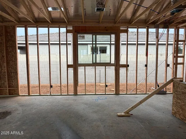 a view of room with floor to ceiling windows