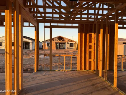 a view of a swimming pool and lounge chair