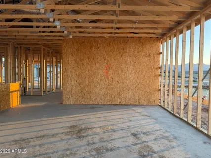 a view of a swimming pool with a yard