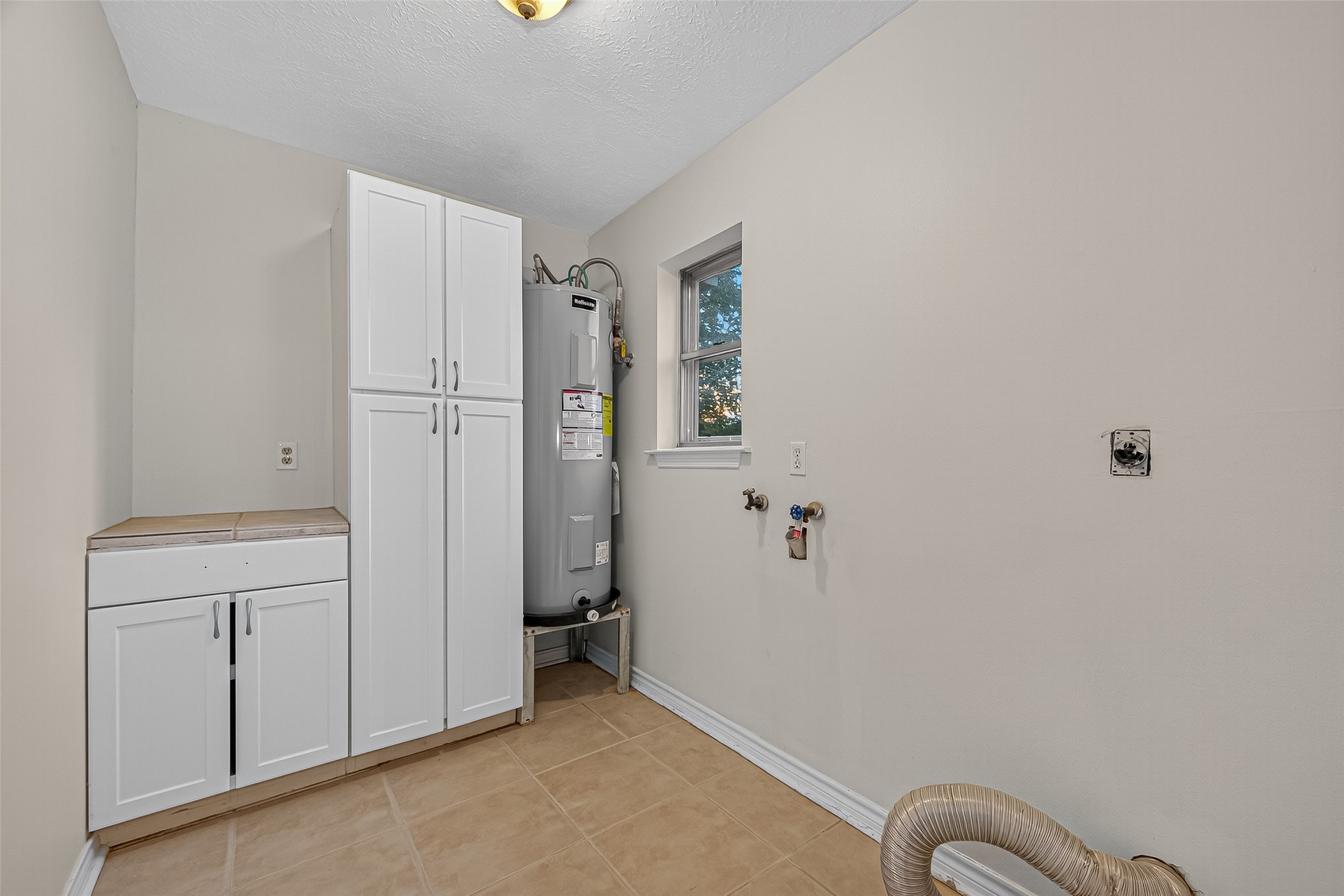 3122 Kueck Road Rosenberg, TX 77471 - Photo 17 of 25 a view of a storage and utility room with closet