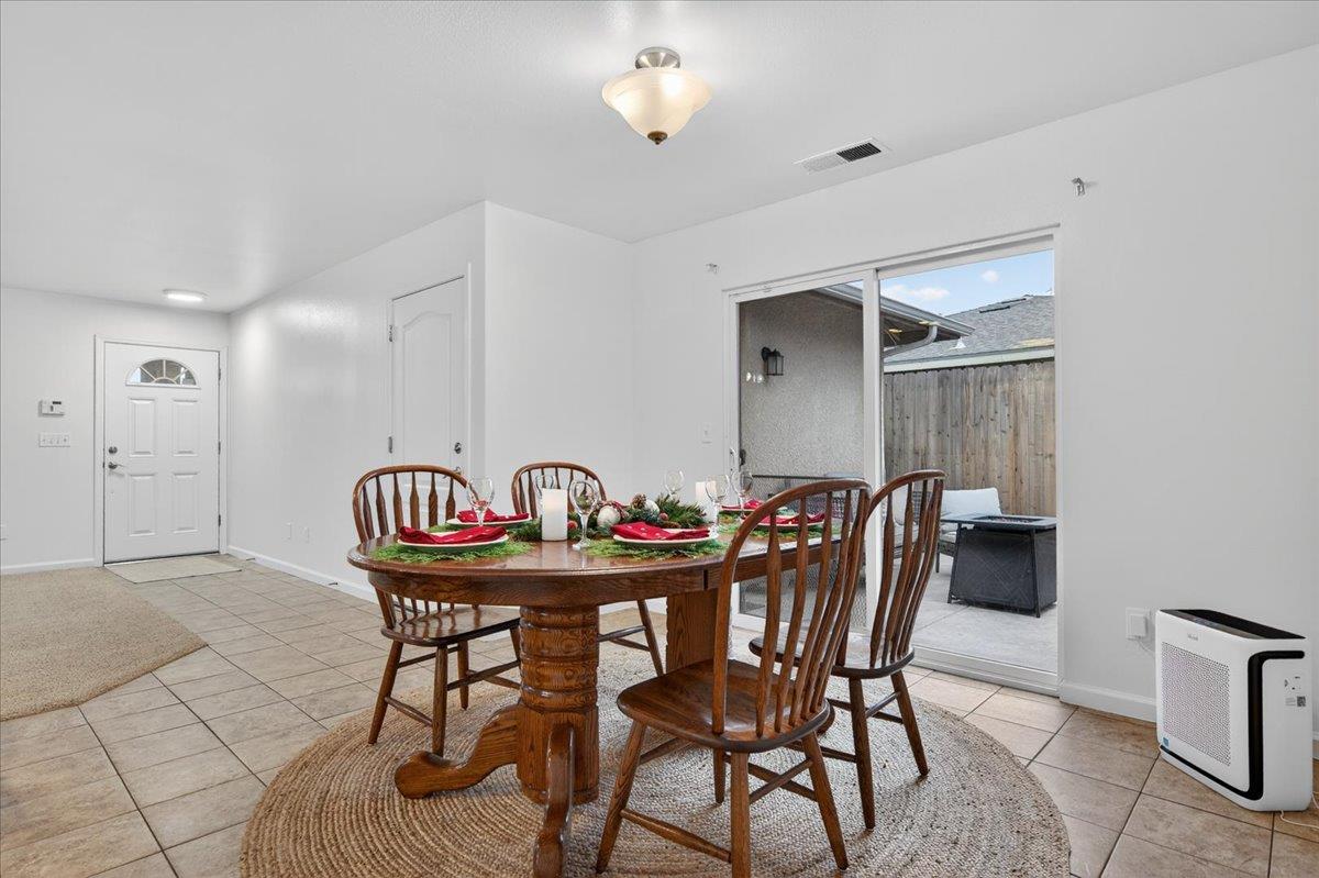 4776 East Rialto Avenue Fresno, CA 93726 - Photo 13 of 54 a view of a dining room with furniture