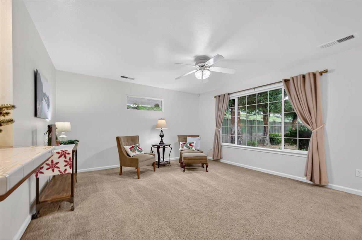 4776 East Rialto Avenue Fresno, CA 93726 - Photo 20 of 54 a living room with furniture and a window