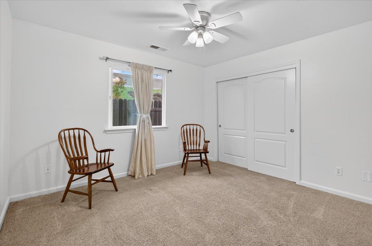 4776 East Rialto Avenue Fresno, CA 93726 - Photo 24 of 54 a view of a workspace with furniture and a window
