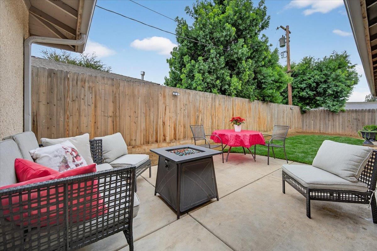 4776 East Rialto Avenue Fresno, CA 93726 - Photo 43 of 54 a patio with couch and a table