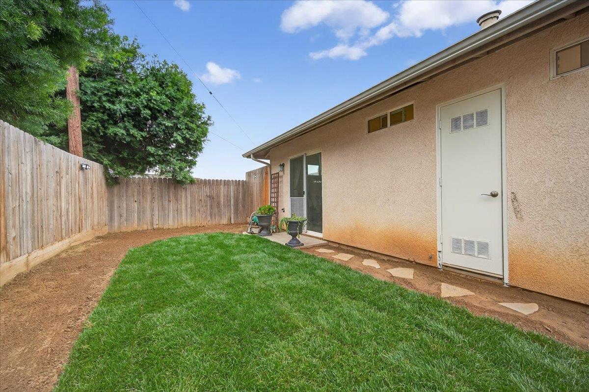 4776 East Rialto Avenue Fresno, CA 93726 - Photo 46 of 54 a backyard of a house with green space
