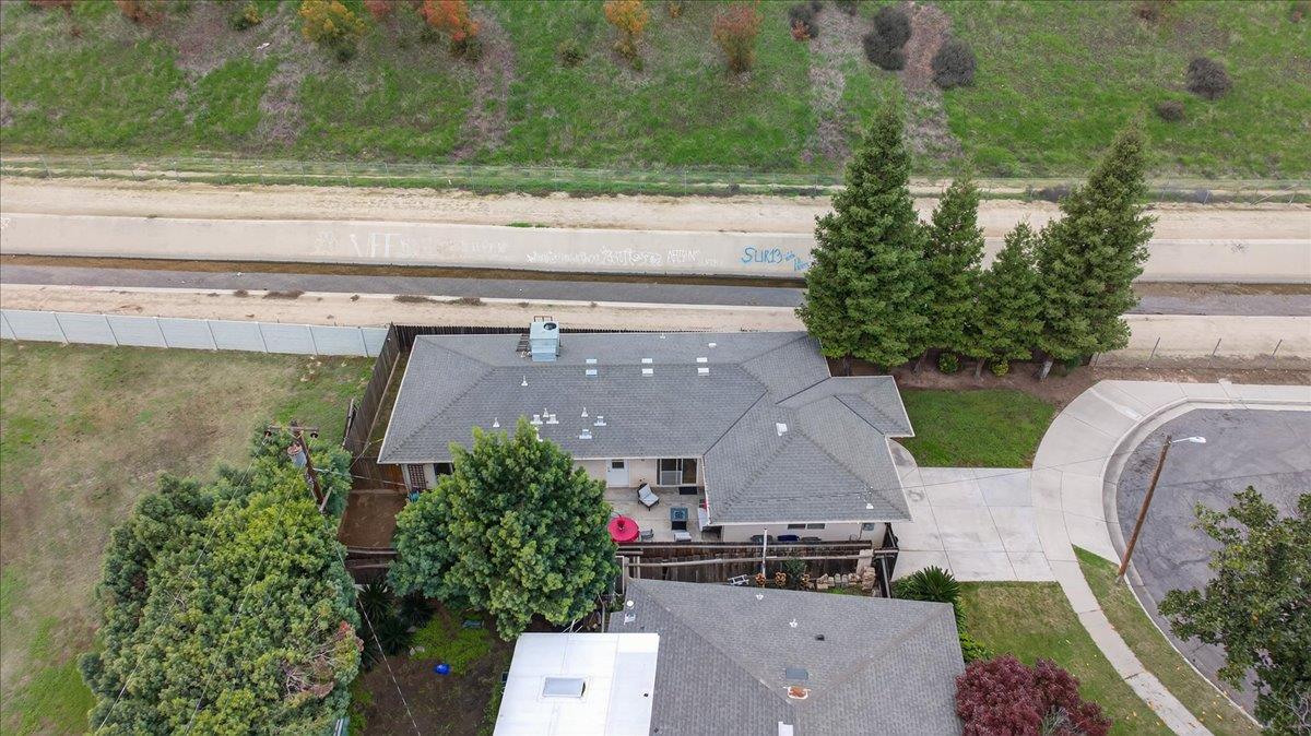 4776 East Rialto Avenue Fresno, CA 93726 - Photo 52 of 54 an aerial view of a house with garden space and street view