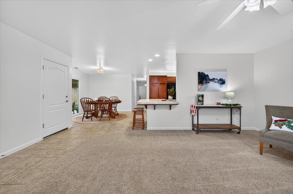 4776 East Rialto Avenue Fresno, CA 93726 - Photo 7 of 54 a living room with furniture and a flat screen tv