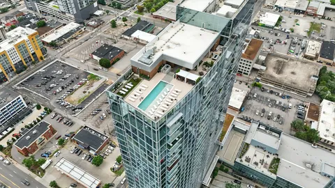 an aerial view of a city with lots of residential buildings