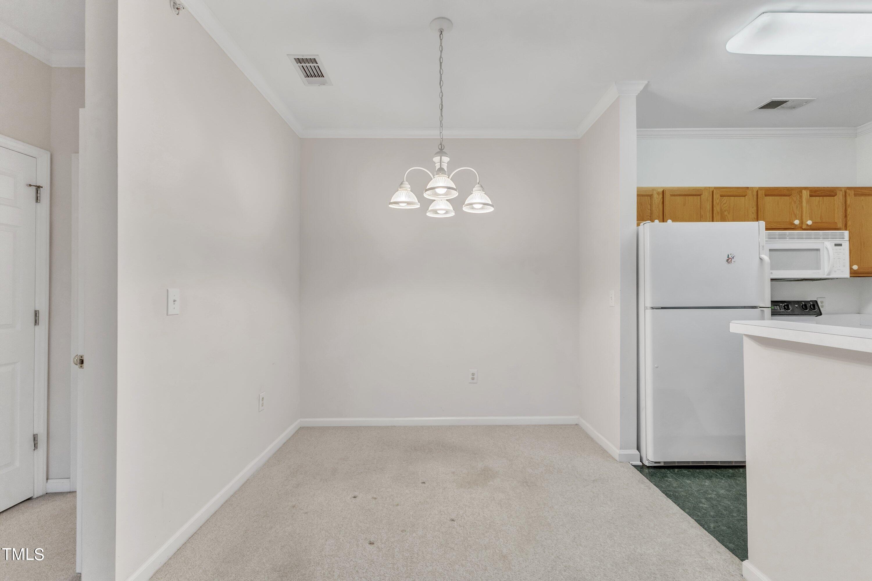 720 North Person Street, Unit 306 Raleigh, NC 27604 - Photo 7 of 13 a view of a room with storage and utility