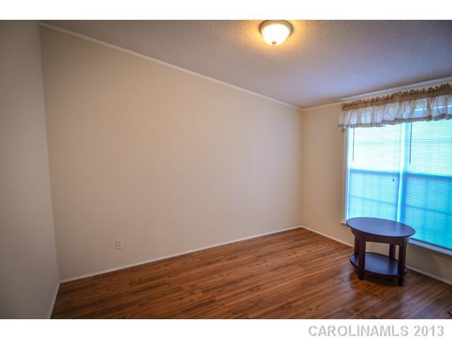 4520 Plyler Mill Road Monroe, NC 28112 - Photo 12 of 16 a view of an empty room with a window
