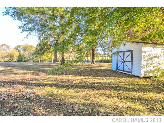 4520 Plyler Mill Road Monroe, NC 28112 - Photo 4 of 16 a view of an outdoor space and a yard