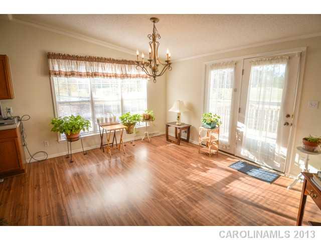 4520 Plyler Mill Road Monroe, NC 28112 - Photo 8 of 16 a living room with furniture and a large window