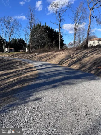 a view of a backyard of the house