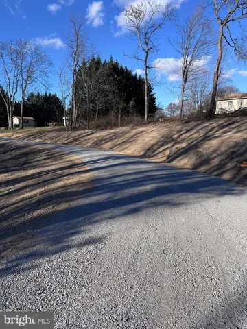 a view of a backyard of the house
