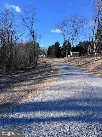 a view of road with trees