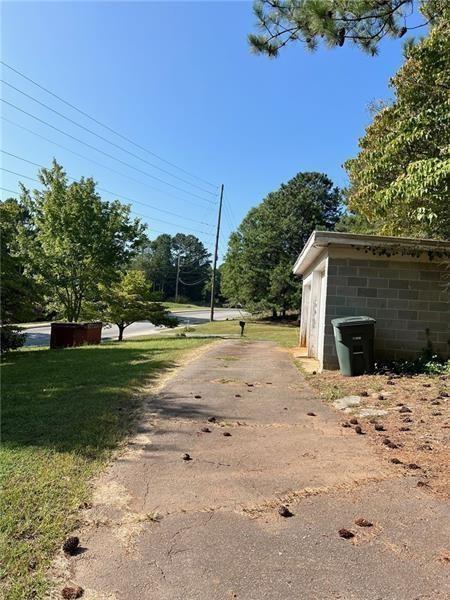 3743 Jiles Road Kennesaw, GA 30144 - Photo 21 of 21 a view of a house with a yard