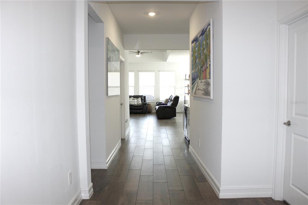 18331 Serene Lk Loop Lutz, FL 33548 - Photo 13 of 46 a view of entryway with livingroom and furniture