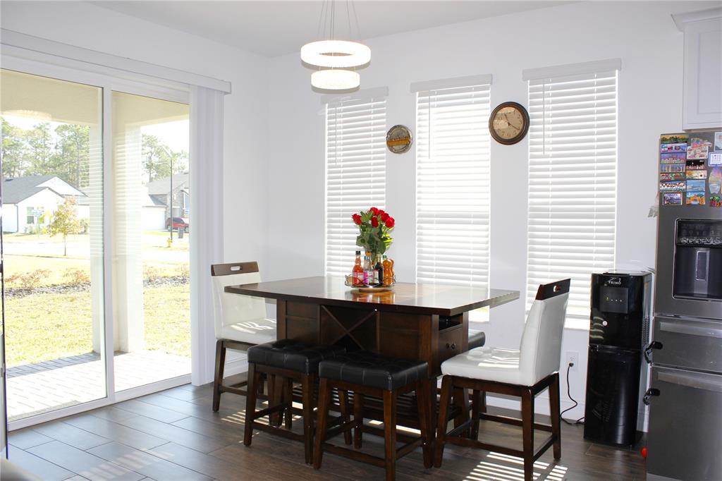18331 Serene Lk Loop Lutz, FL 33548 - Photo 25 of 46 a view of a workspace with furniture and a window