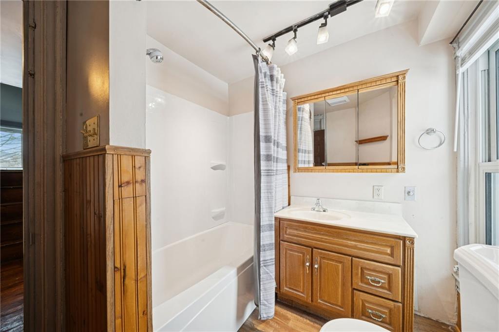 410 Point Street Saltsburg, PA 15681 - Photo 25 of 39 a bathroom with a sink a mirror and a shower