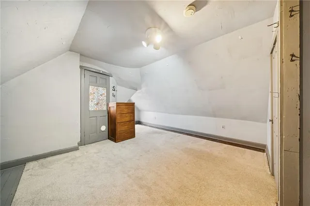 a view of roof deck with a barbeque and wooden stairs