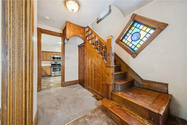workspace with wooden floor and stairs