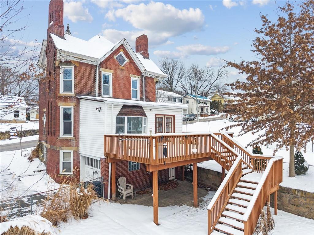 410 Point Street Saltsburg, PA 15681 - Photo 33 of 39 a front view of a house with a bench