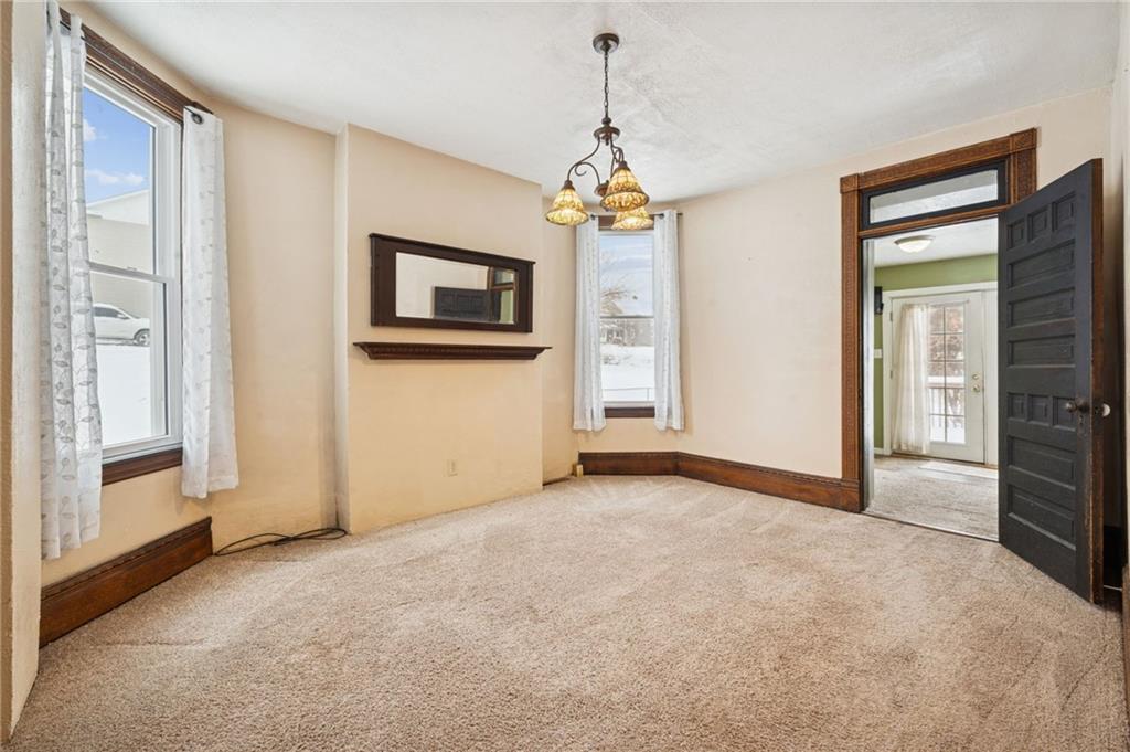 410 Point Street Saltsburg, PA 15681 - Photo 6 of 39 a view of a livingroom with a chandelier fan and windows