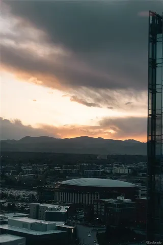 a view of a swimming pool with a table and chairs