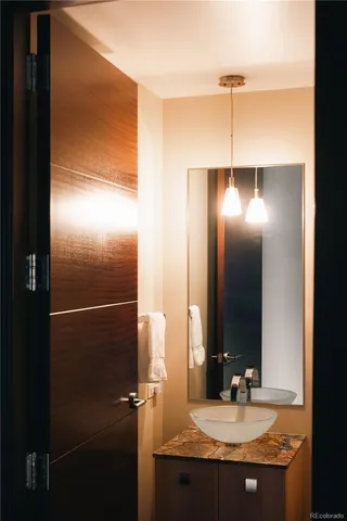 a blue and white room sitting next to a window