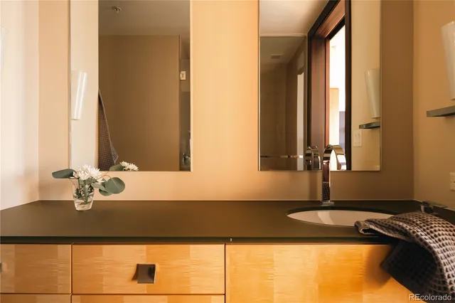 a view of an entryway with a table and chairs