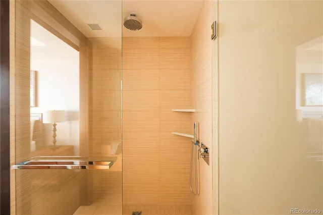 a dining table with chairs and window