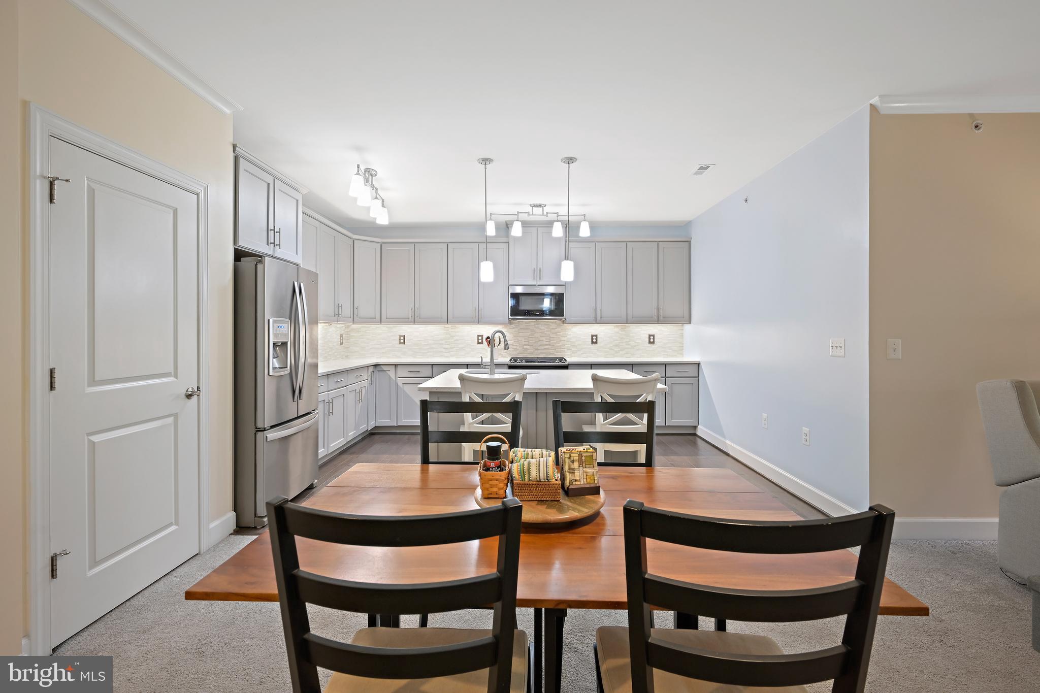 10520 Resort Road, Unit 306 Ellicott City, MD 21042 - Photo 10 of 46 View from Dining Room to Kitchen