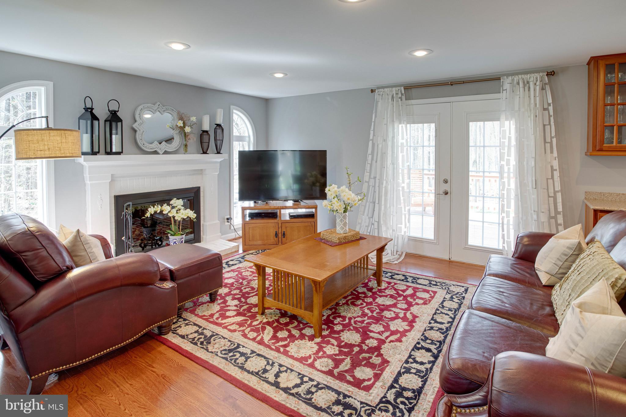 11946 Appling Valley Road Fairfax, VA 22030 - Photo 12 of 58 Family room with gas fireplace