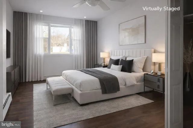 a bedroom with bed and window