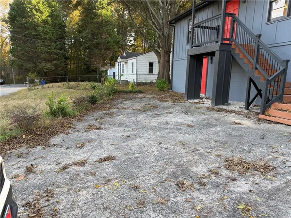 a view of backyard of house