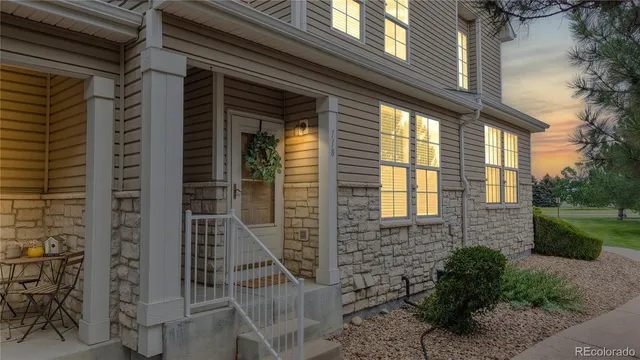 a view of brick house with a large windows