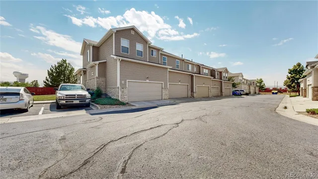 a car parked in front of a house