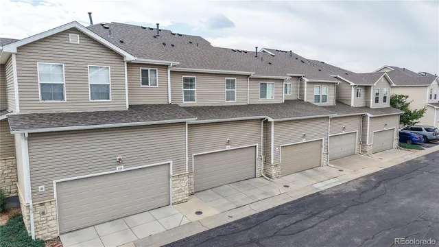 a view of a house with a garage