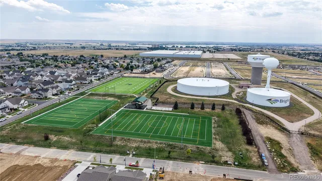 an aerial view of a house with a ocean view