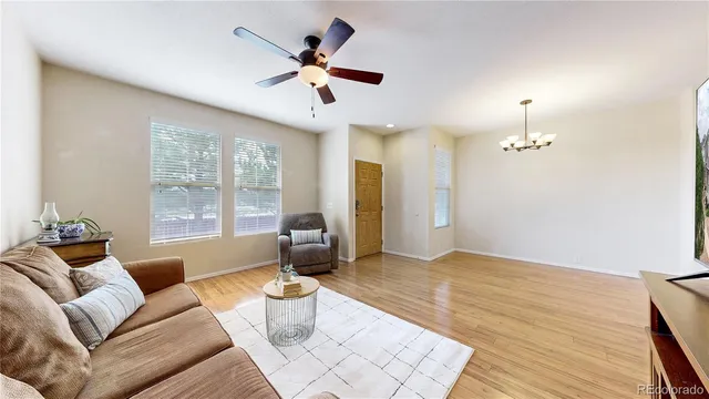 a living room with furniture and window