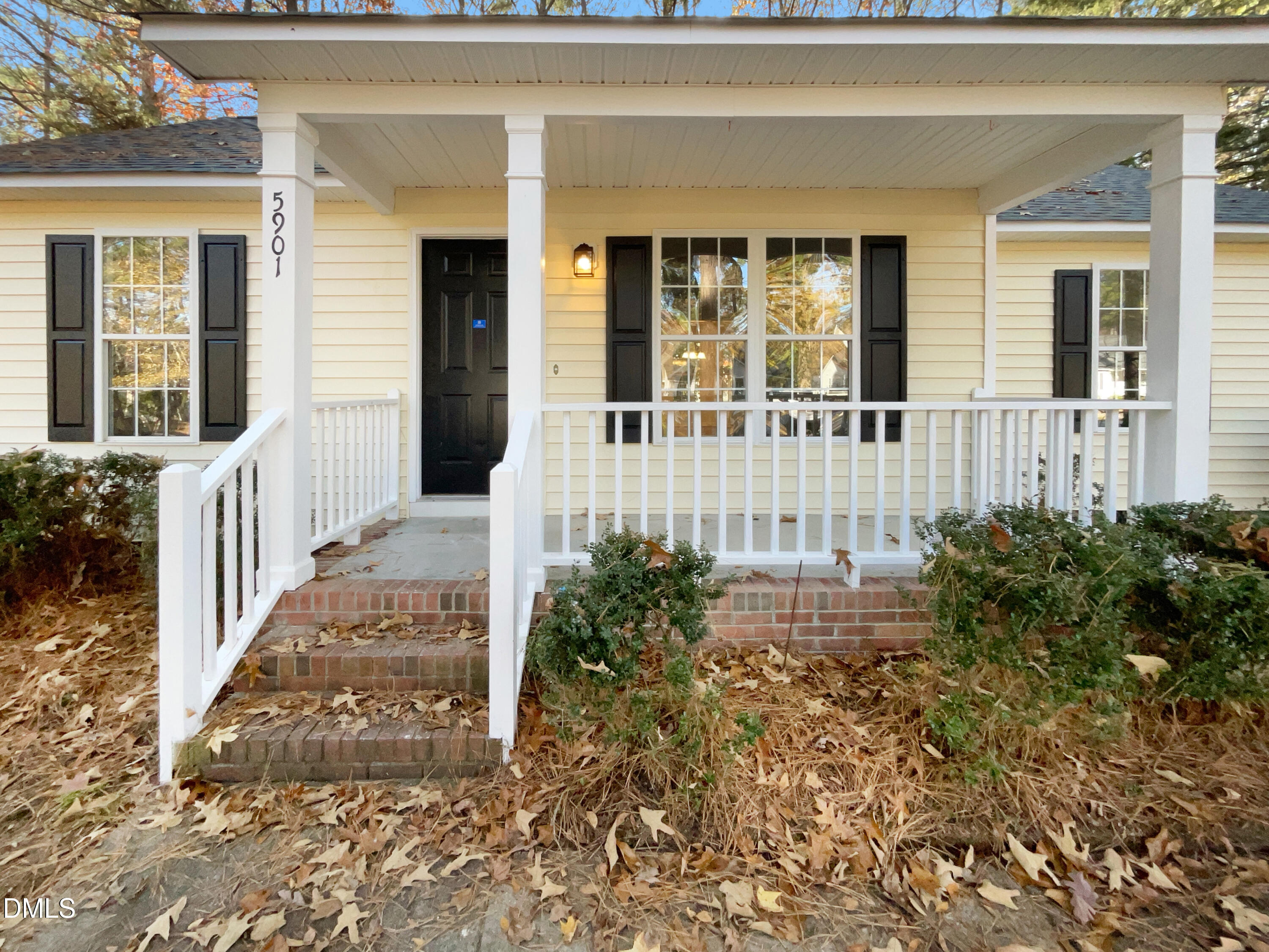 5901 Presentation Street Knightdale, NC 27545 - Photo 14 of 16 front view of a house with a small yard