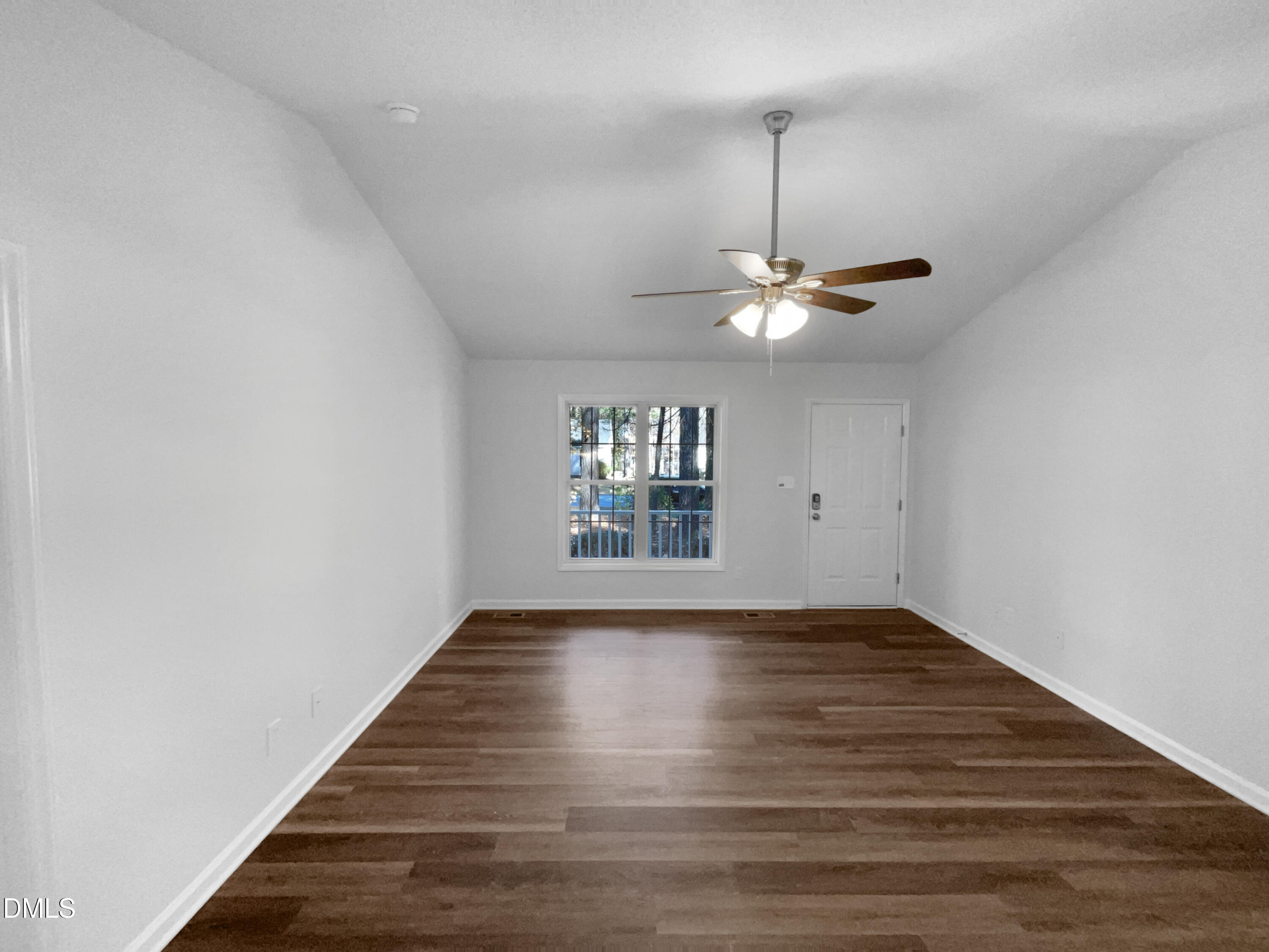 5901 Presentation Street Knightdale, NC 27545 - Photo 3 of 16 a view of a room with window and wooden floor