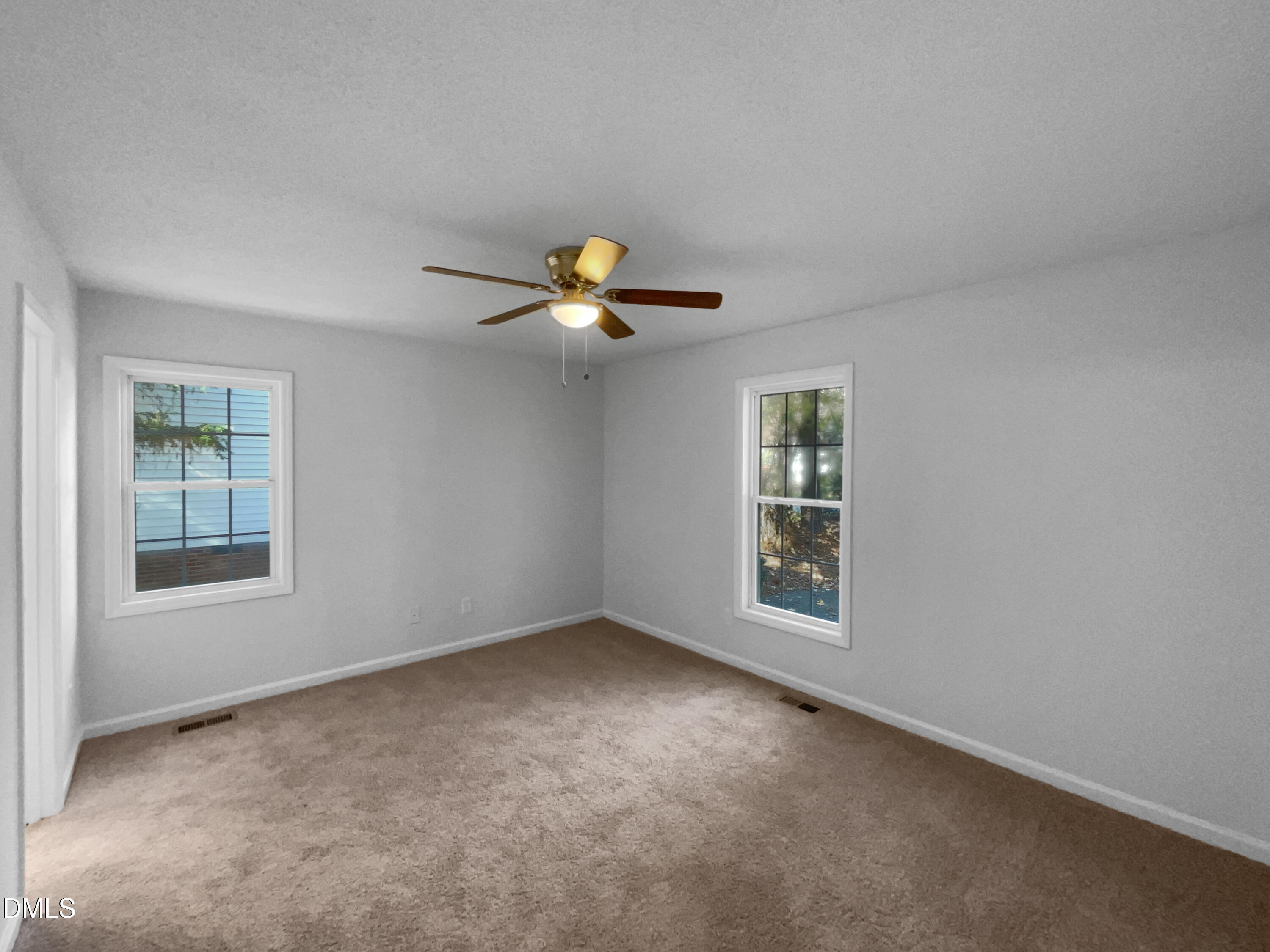 5901 Presentation Street Knightdale, NC 27545 - Photo 4 of 16 a view of an empty room with a window